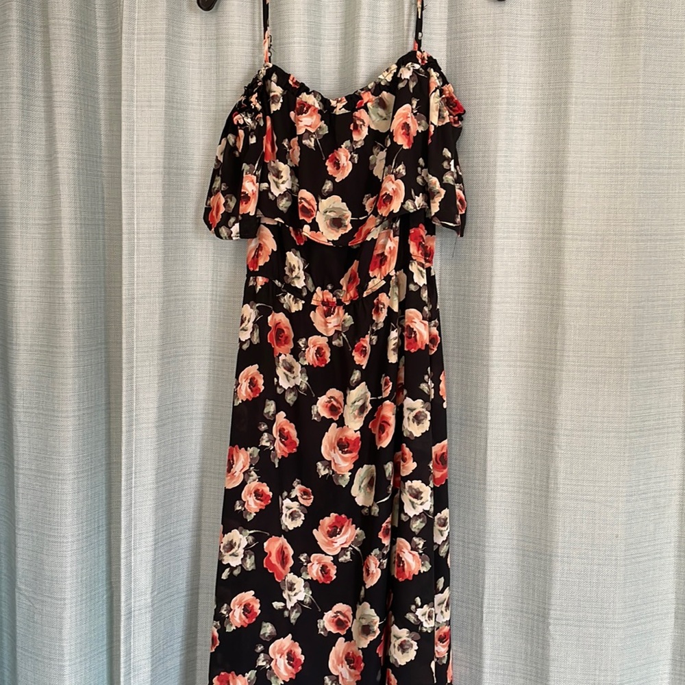 Floral dress. Size med. spaghetti straps with arm caps.
